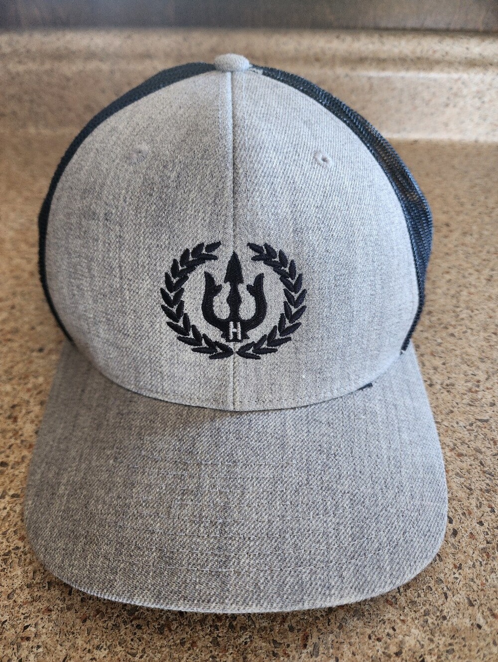 Y2K Tucker Gray and Black Trident Wreath Trucker Hat